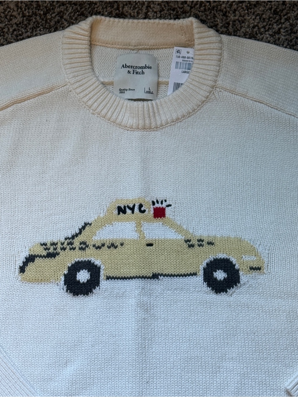 Abercrombie & Fitch women’s  Cream NYC Taxi Knit Sweater